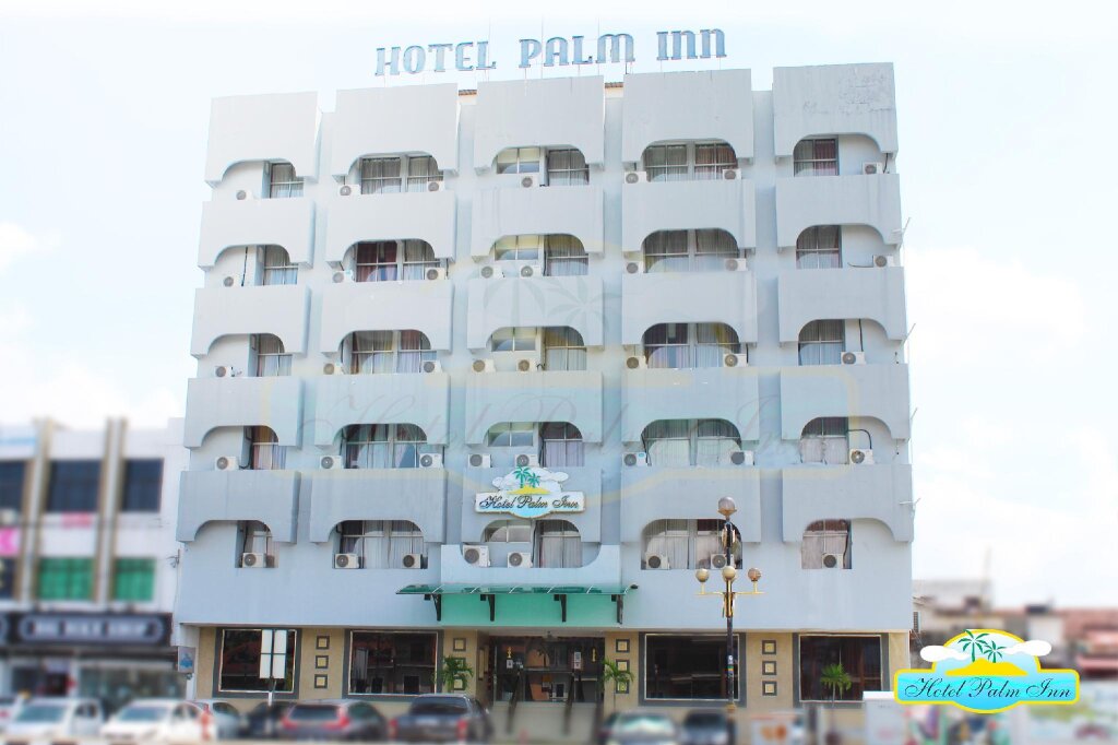 Кровать в общем номере с 2 комнатами Hotel Palm Inn Butterworth