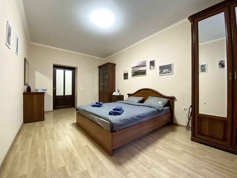 Кровать в общем номере с 2 комнатами Апартаменты Ютрип на ул. Зинина, д. 34