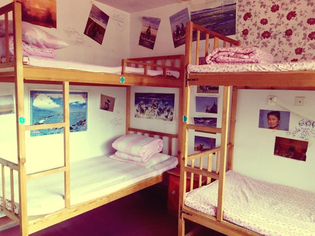 Кровать в общем номере Anda Guesthouse