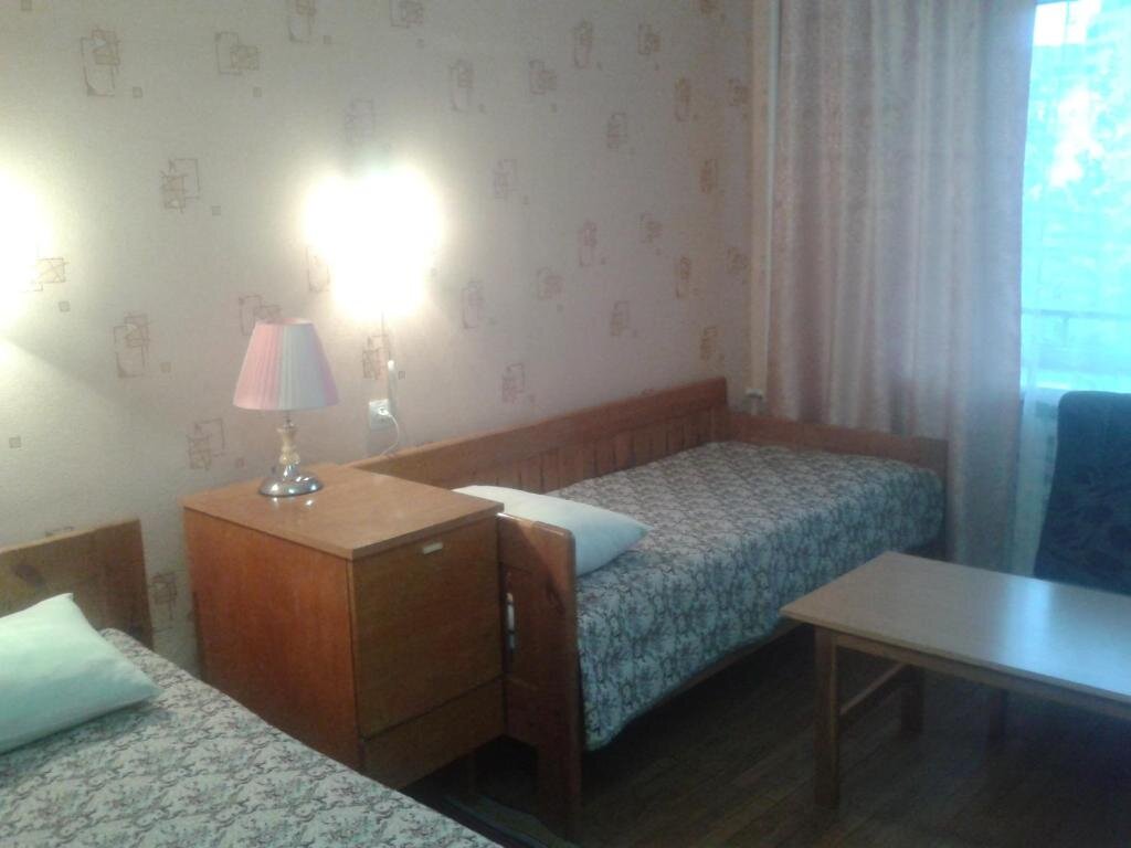 Кровать в общем номере Отель Днепропетровск