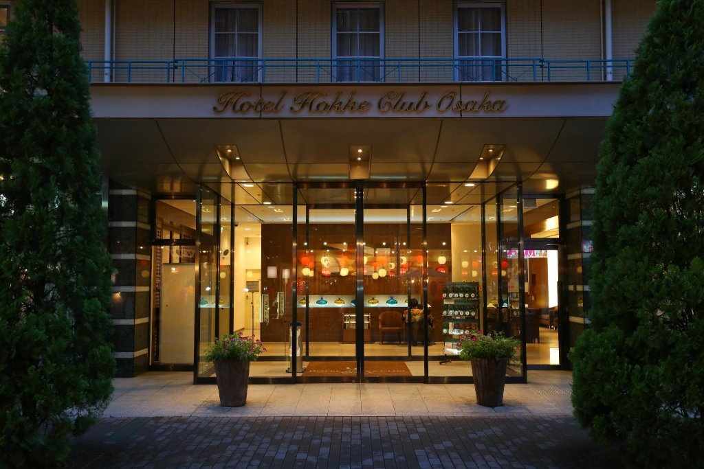 Кровать в общем номере Hotel Hokke Club Osaka