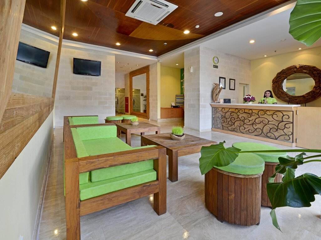 Кровать в общем номере Whiz Hotel Malioboro Yogyakarta