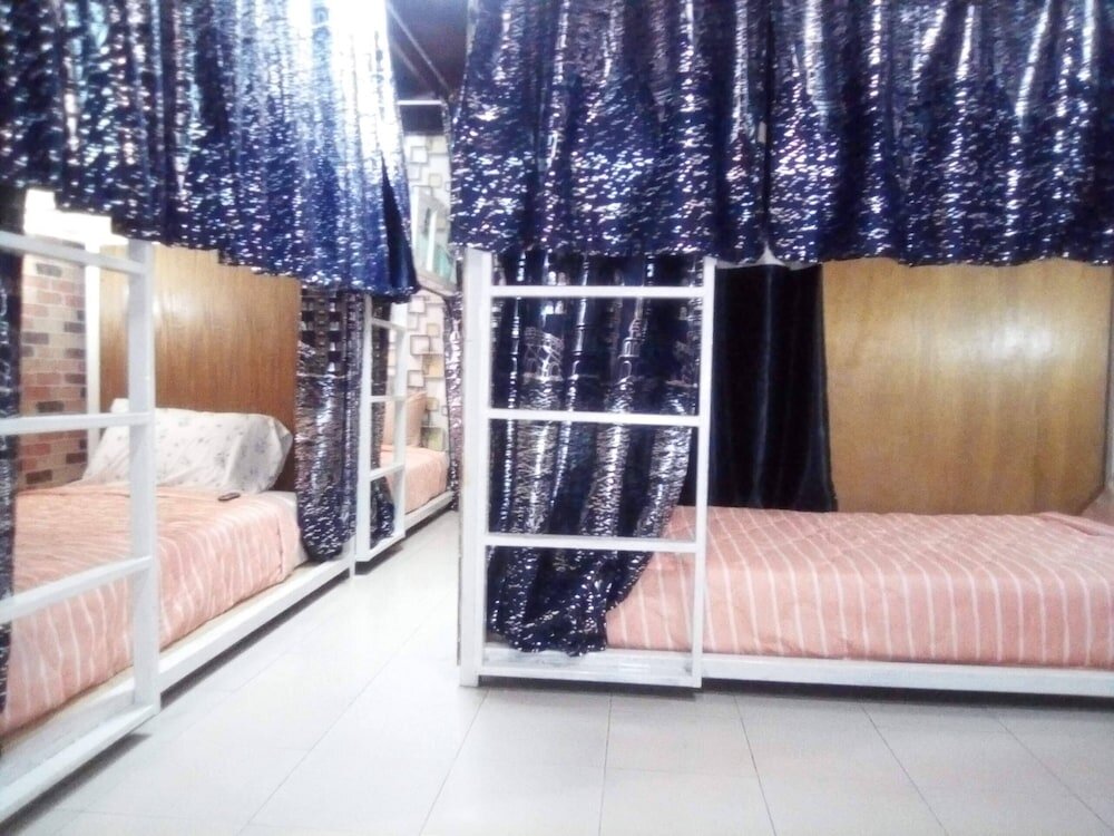 Кровать в общем номере Ban Kru Ae Homestay