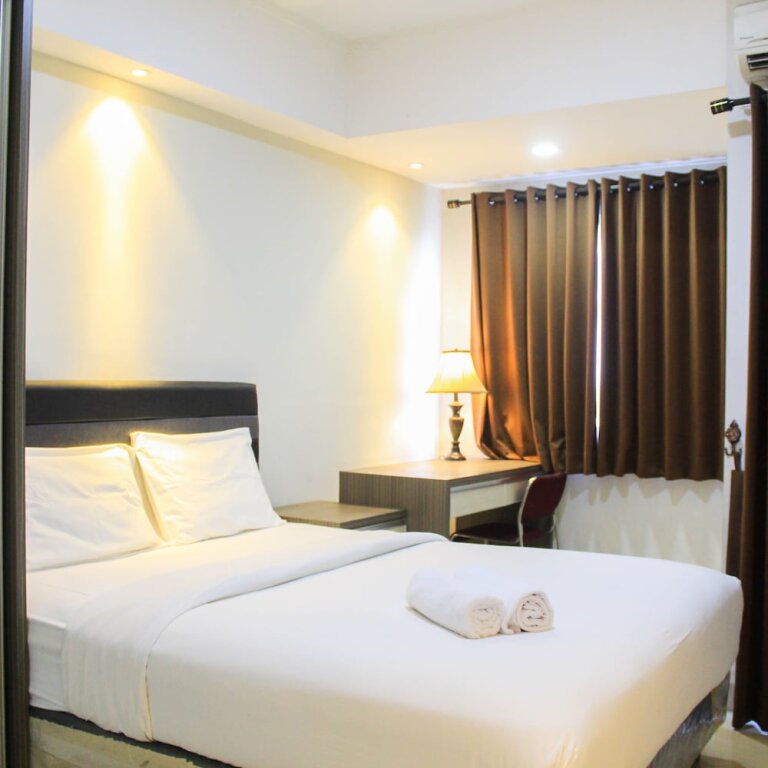 Standard room Fully Furnished with Spacious Design Studio Apartment at The Oasis Cikarang