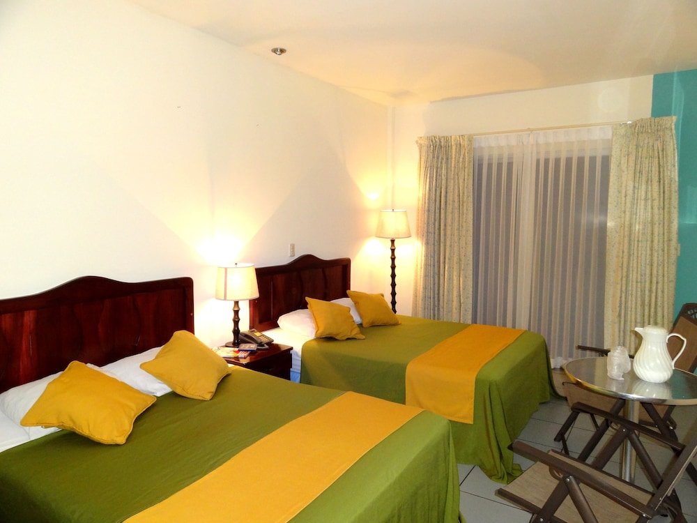 Standard Quadruple room with balcony Hotel Costa Azul County Beach