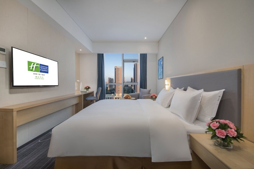 Suite 1 camera da letto Holiday Inn Express Yantai Yeda, an IHG Hotel