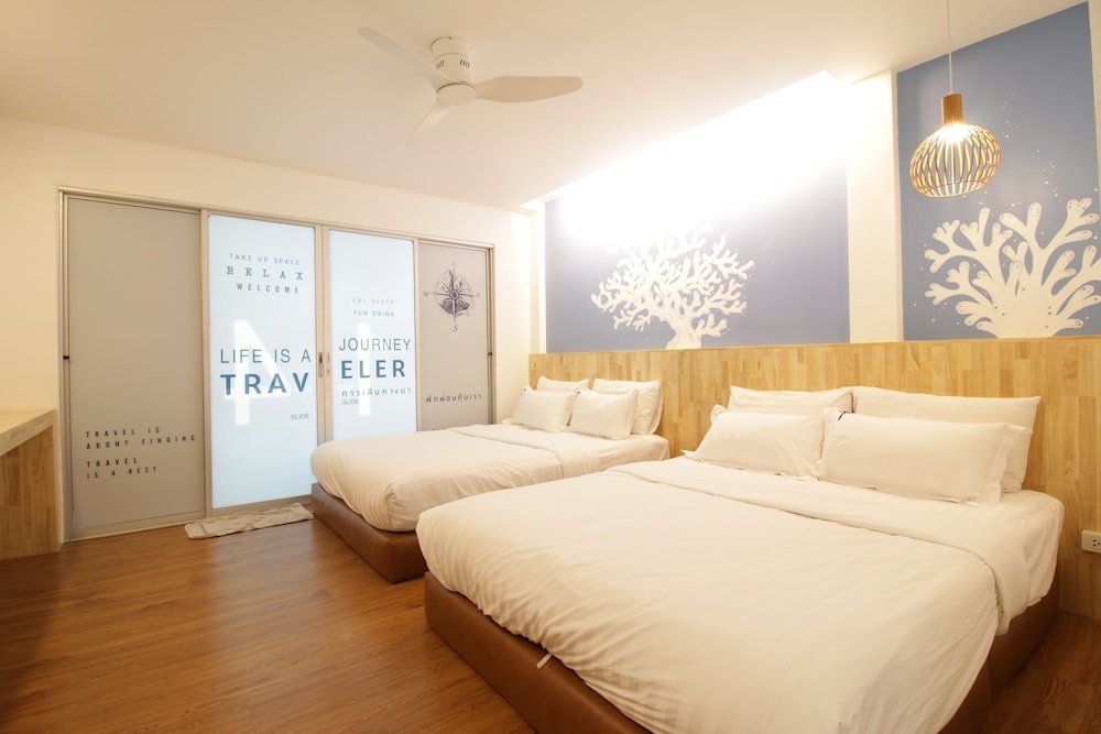 Standard Quadruple room with balcony Tawaen Beach Resort