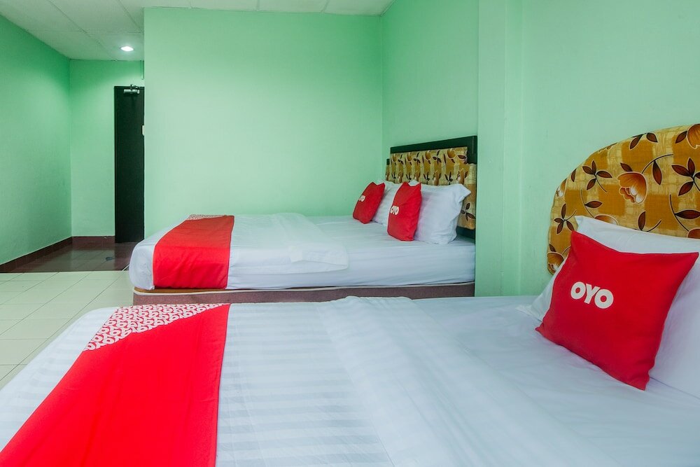 Habitación De lujo OYO 90124 Payang Puri Baru Hotel