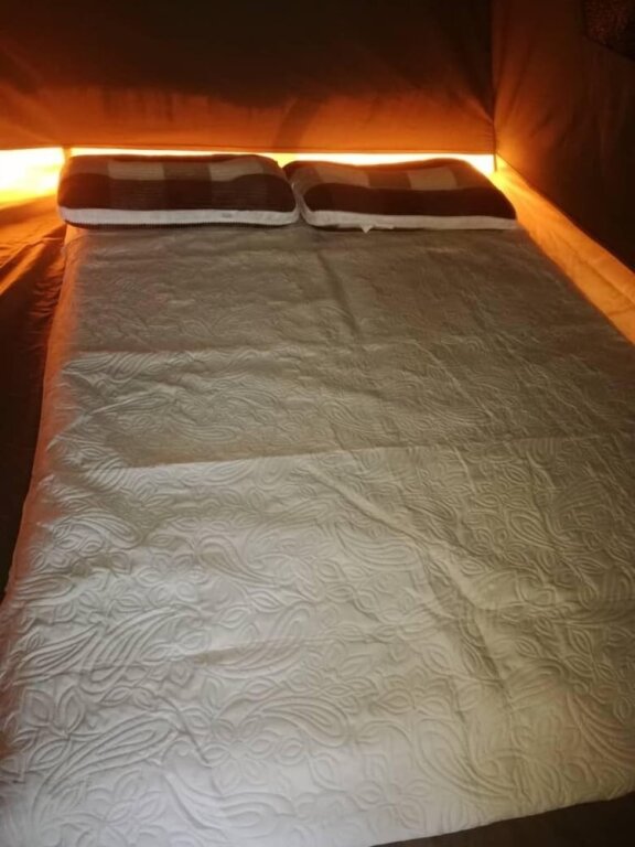 Bett im Wohnheim Nahubwe Safari Lodge
