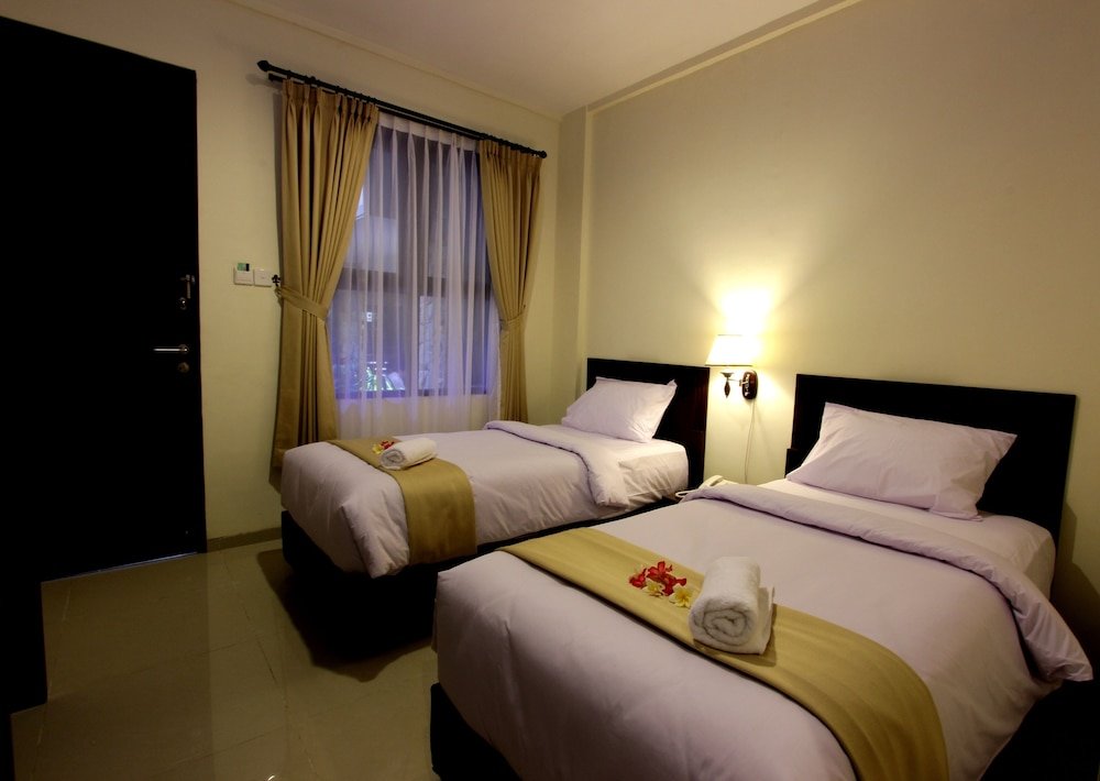 Superior room with balcony and with pool view Manggar Indonesia Hotel