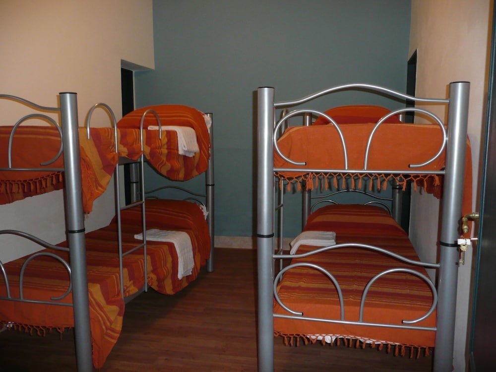 Кровать в общем номере Hostel Sol de Oro