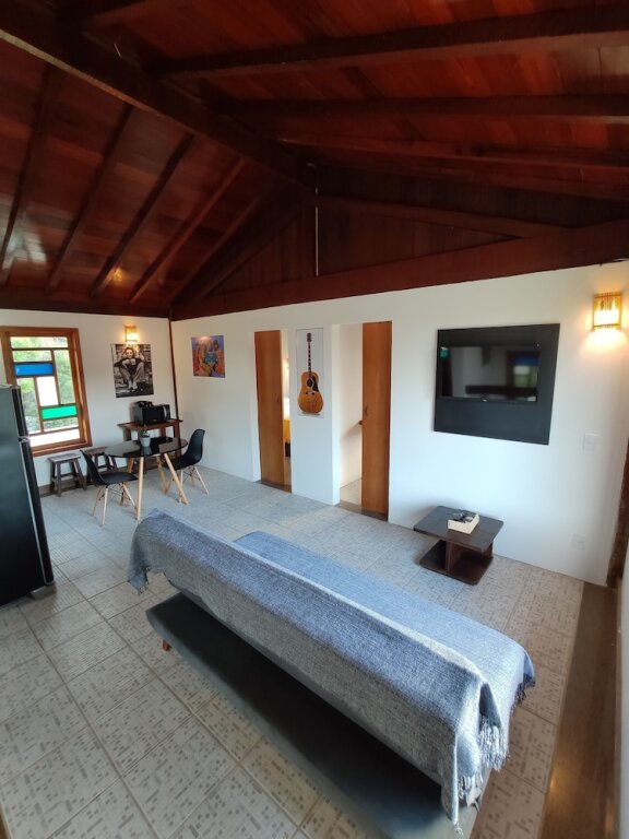 Quadruple Studio with balcony and with view Casa Larrosa Itaúna Adults Only