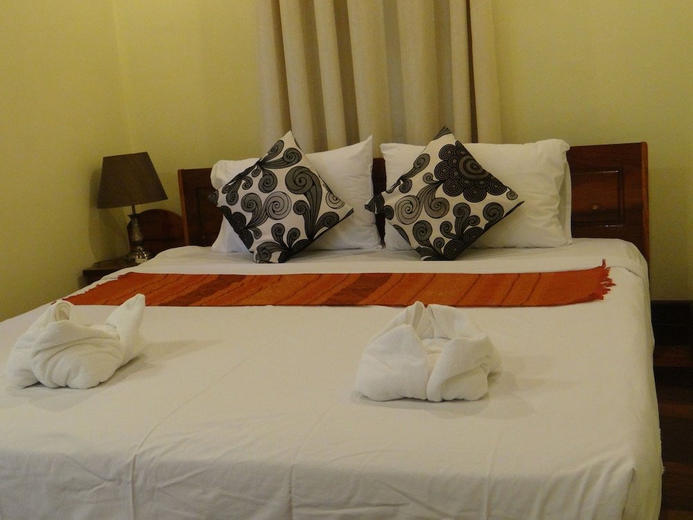 Deluxe Double room with balcony and with river view Villa Somphong Namkhan View
