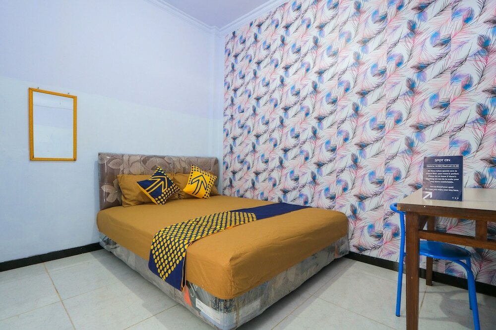 Économie double chambre OYO 2497 Pesona Guest House