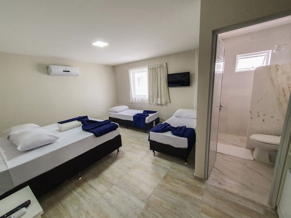 Confort quadruple chambre Pousada Maresia Unique Beira Mar