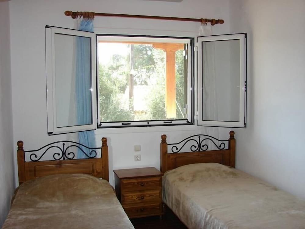 Апартаменты с 2 комнатами с балконом и с видом на сад Olympia Paxos Villas & Apartments