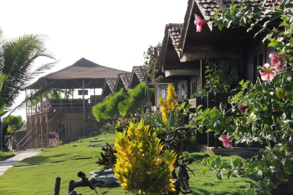 Двухместный коттедж с балконом и с видом на сад Lotus Sutra