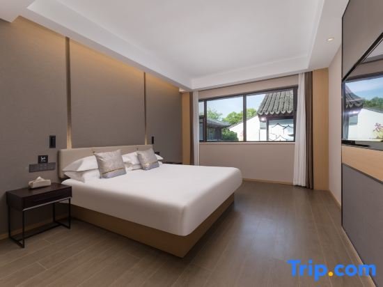 Кровать в общем номере Zhuozheng Bieyuan Hotel