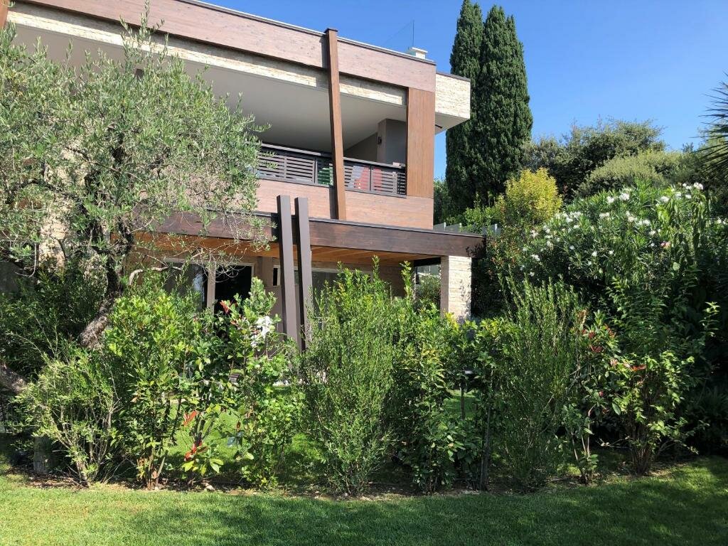 Appartamento con vista sul giardino Lamasu RioVerde - Lago di Garda
