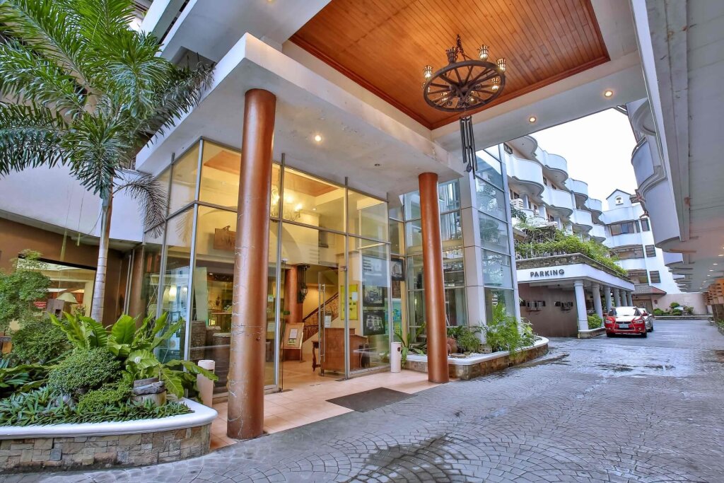 Кровать в общем номере Мансарда Crown Regency Residences Cebu - Quarantine Hotel