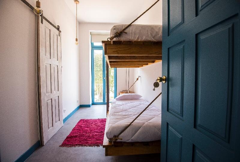 Cama en dormitorio compartido 1 dormitorio Des Arts