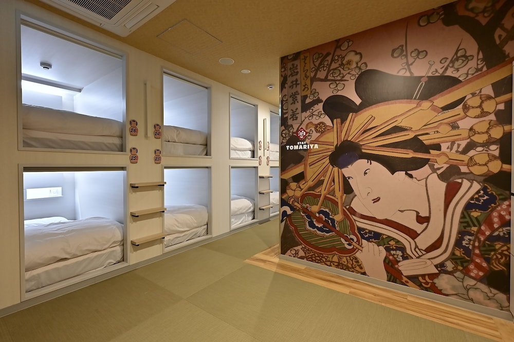 Кровать в общем номере (женский номер) Hotel Tomariya Ueno