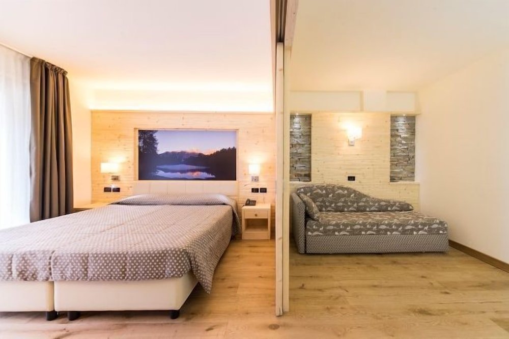 Standard Zimmer Alpholiday Dolomiti Wellness & Family Hotel