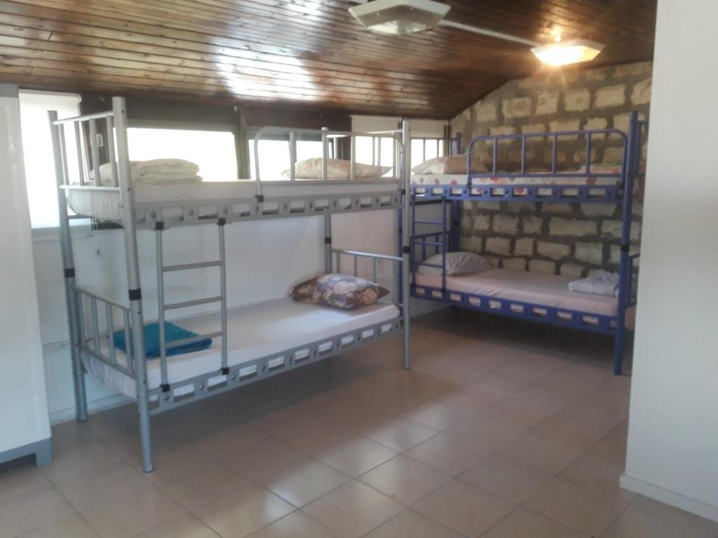 Кровать в общем номере German Colony Guest House- Private and Dorm rooms