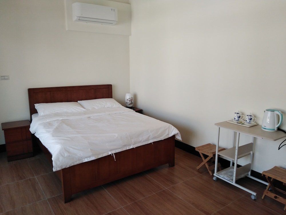 Standard double chambre avec balcon 星海芝家民宿Samuel's Home
