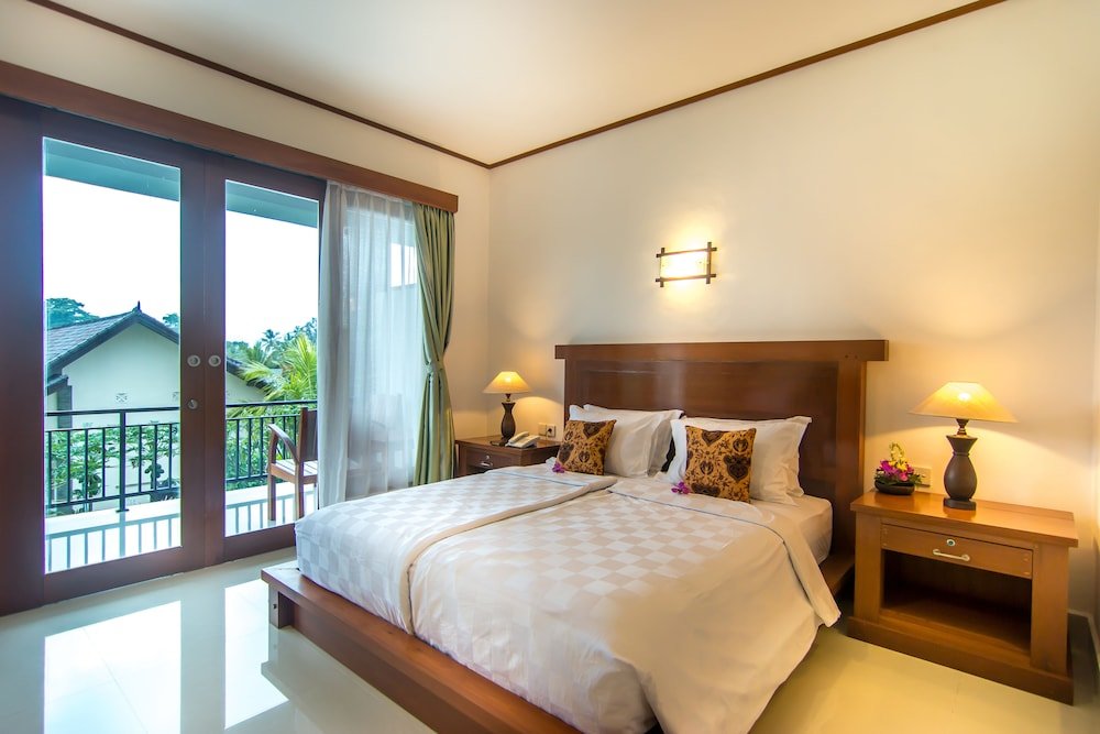 Deluxe room with garden view Gita Maha Ubud Hotel by Mahaputra-CHSE Certified