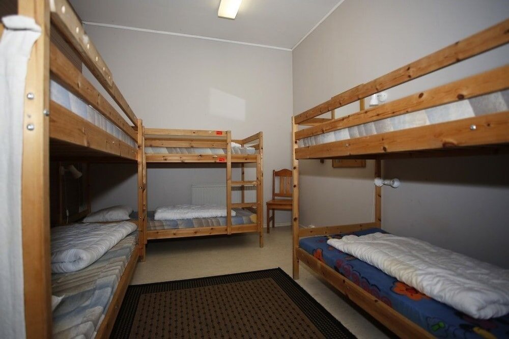 Кровать в общем номере Visby Fängelse