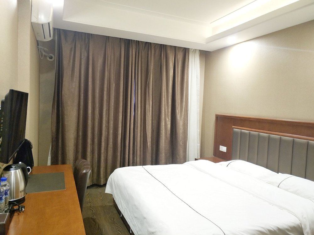 Номер Comfort Huaxi Hotel