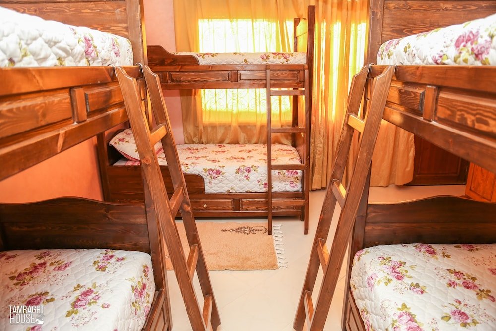 Кровать в общем номере Tamraght House Bay
