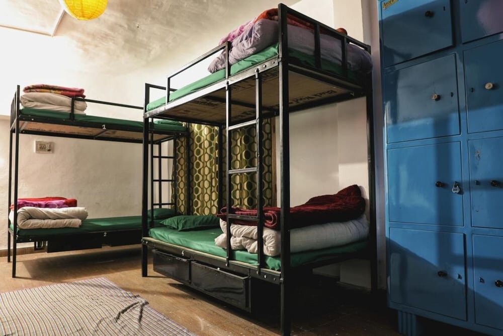 Кровать в общем номере Nomads Hostel
