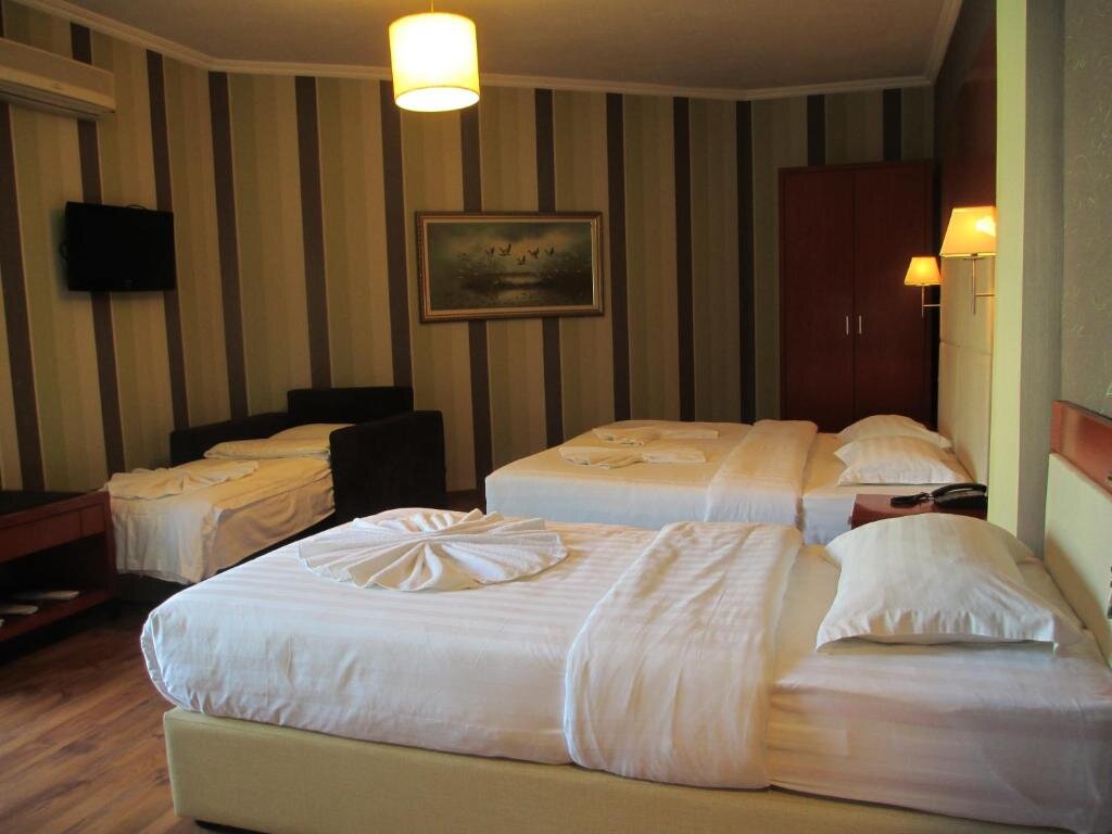 Standard quadruple chambre Bel Conti Hotel