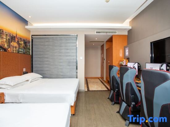 Кровать в общем номере Wangyu Hotel