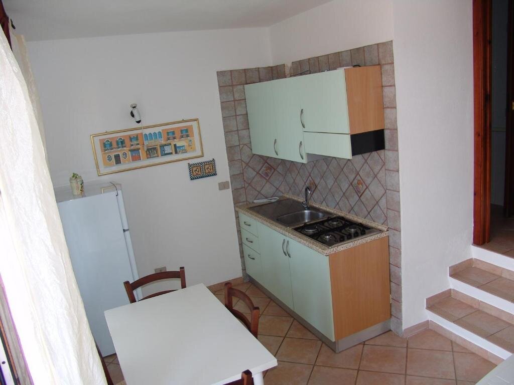 Apartamento 1 dormitorio con vista al mar Villaggio Porto Corallo