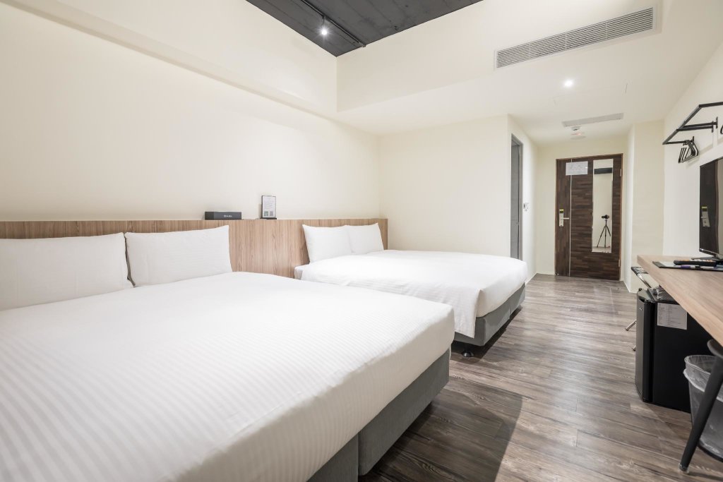 Standard Vierer Zimmer Traveller-Inn Teihua Hotel II