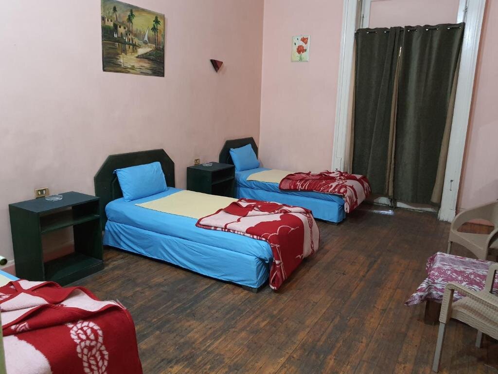 Четырёхместный номер Standard African House Hostel