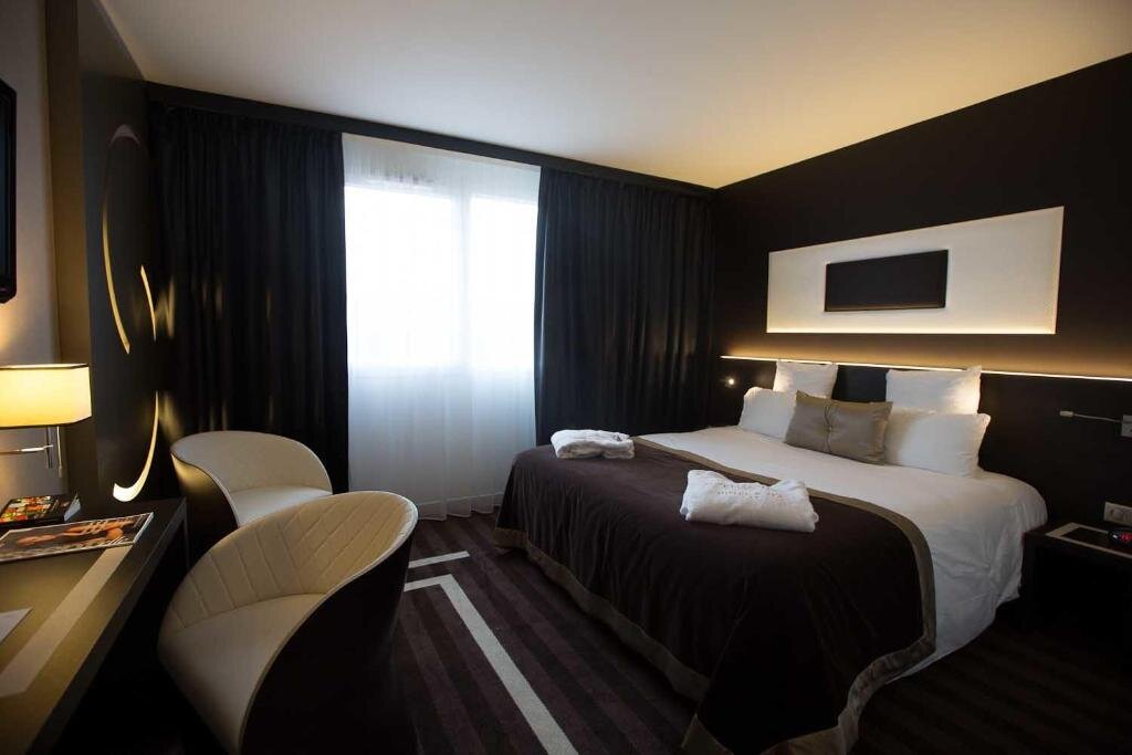 Двухместный люкс c 1 комнатой LE COLISÉE Hotel & Spa NANTES Saint Herblain