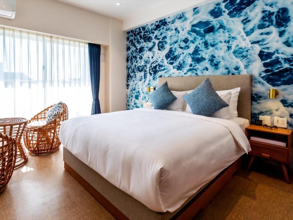 Двухместный номер Deluxe с частичным видом на море The Moana by DSH Resorts