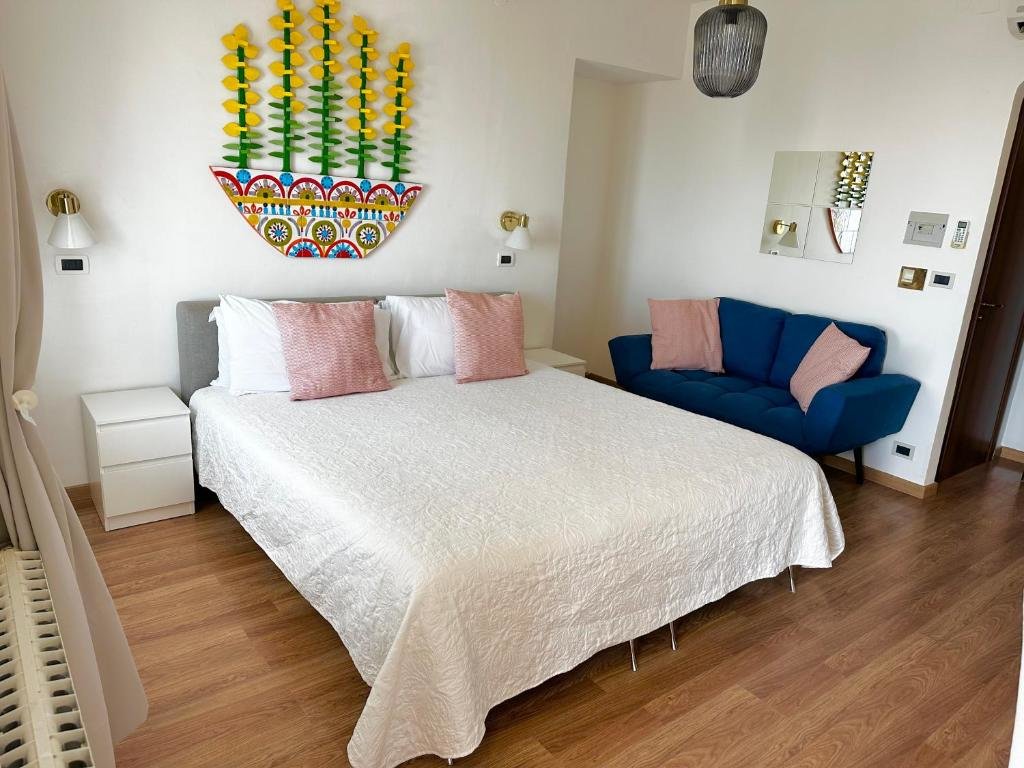 Standard Quadruple room with view Villa Greta Hotel Rooms & Suites