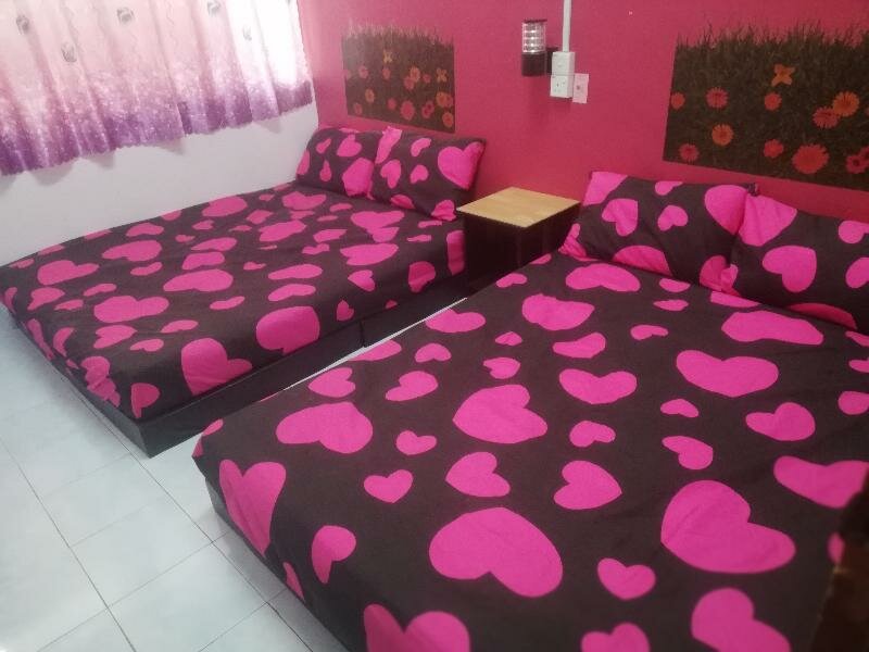 Standard quadruple famille chambre SPOT ON 90156 Bidara Guest House