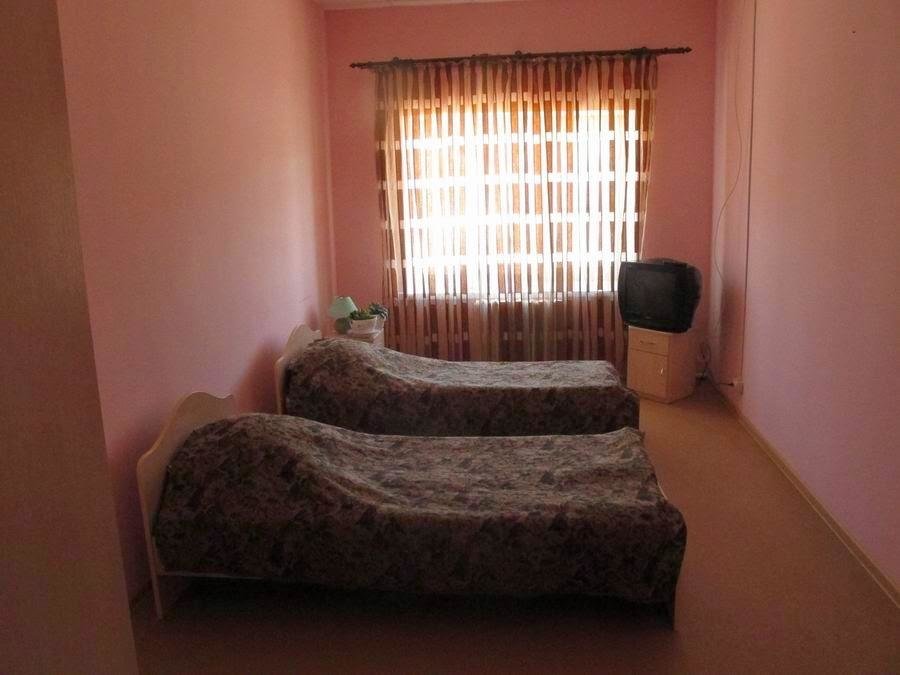 Cama en dormitorio compartido Nyrob