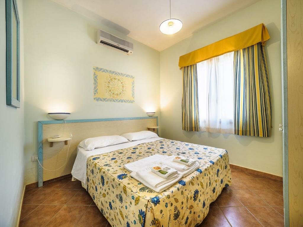 Четырёхместный номер Standard Villaggio Resort Arco Del Saracino