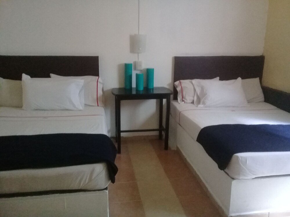 Standard quadruple chambre Hotel Casa Diana
