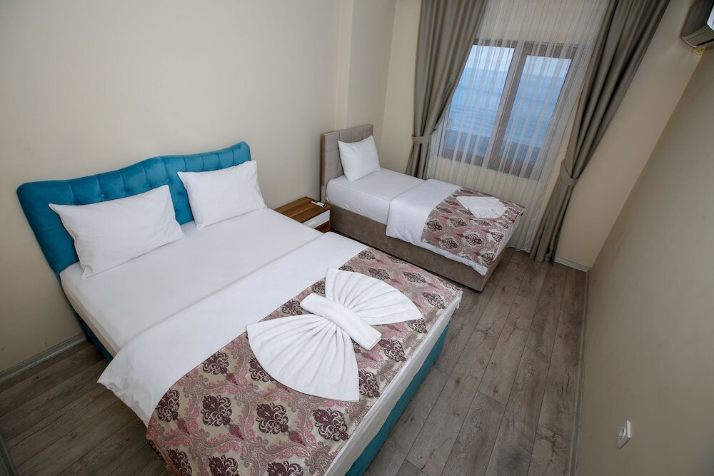 Семейные апартаменты с 2 комнатами Jalal VIP Suite Hotel