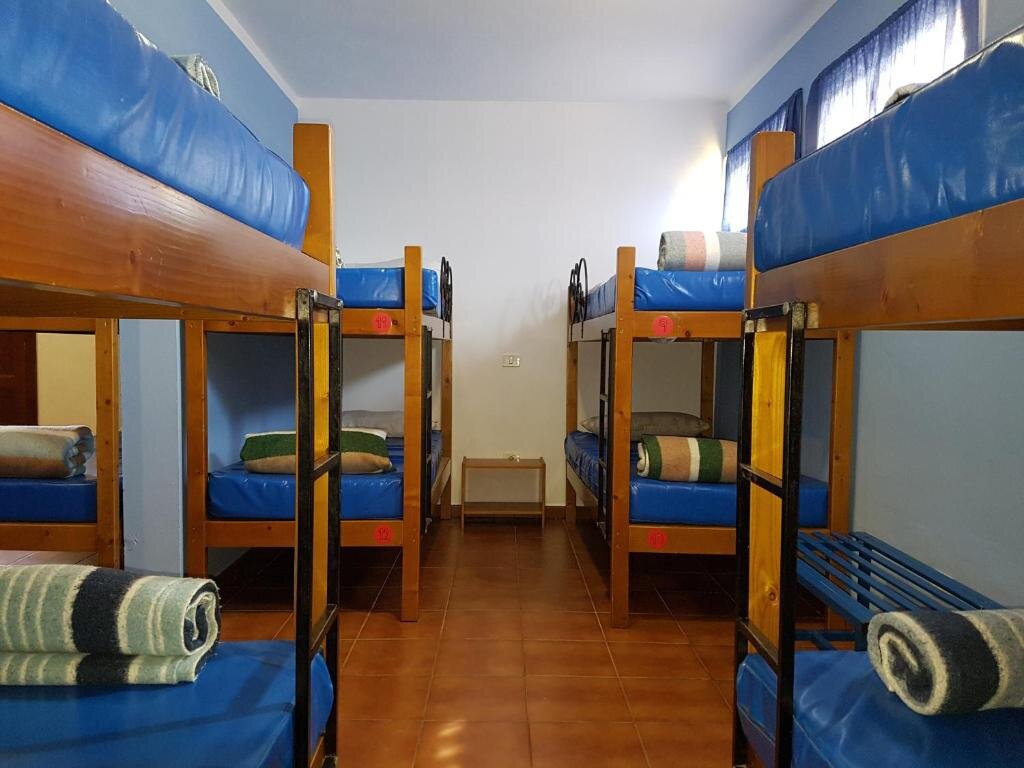Кровать в общем номере La Hoyilla Hostel - La Aldea