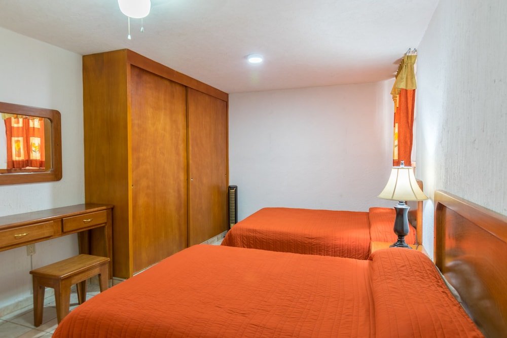 Apartment Suites Poliforum Inn