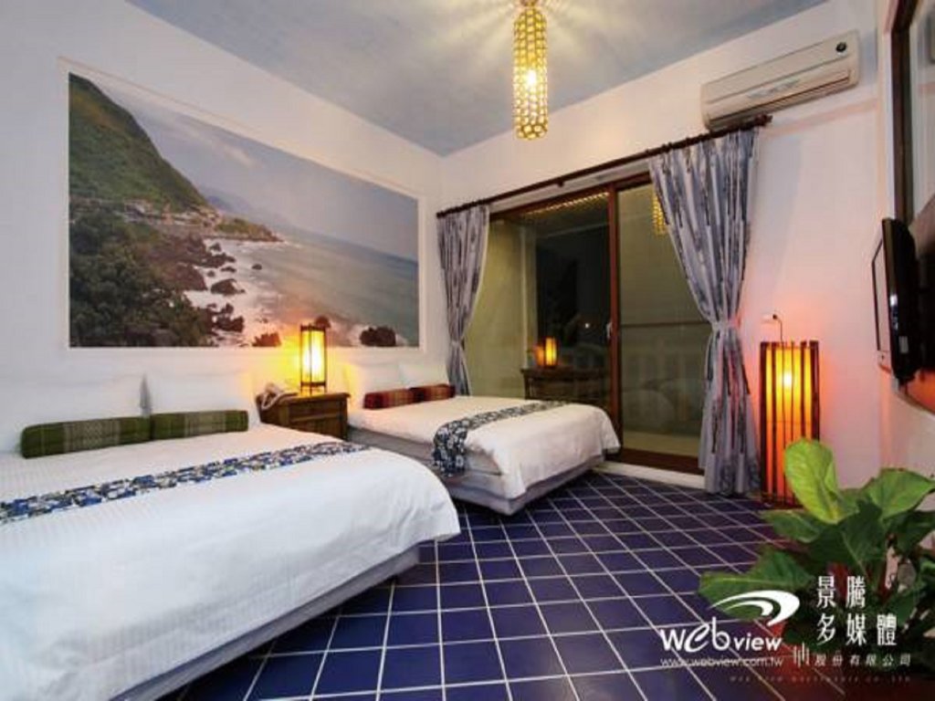 Standard Quadruple room with balcony Beautiful Ilan Resort